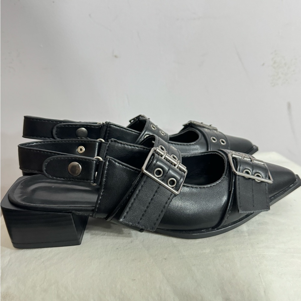 Black buckle flats